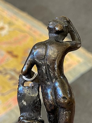 Lot 164 - A patinated bronze figure after the antique