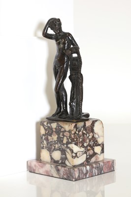 Lot 164 - A patinated bronze figure after the antique