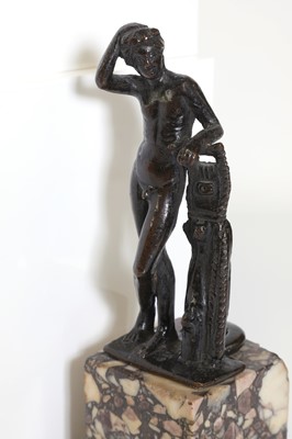 Lot 164 - A patinated bronze figure after the antique