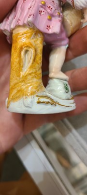 Lot 175 - A pair of porcelain figures