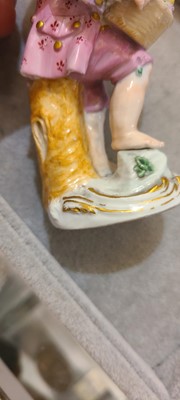 Lot 175 - A pair of porcelain figures