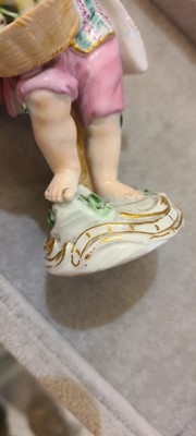 Lot 175 - A pair of porcelain figures