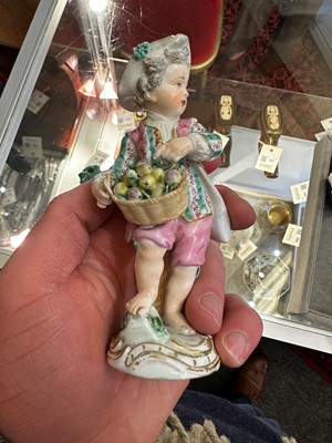 Lot 175 - A pair of porcelain figures