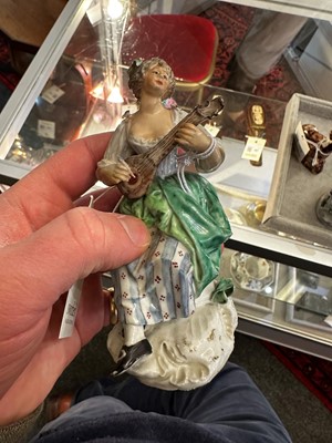 Lot 175 - A pair of porcelain figures