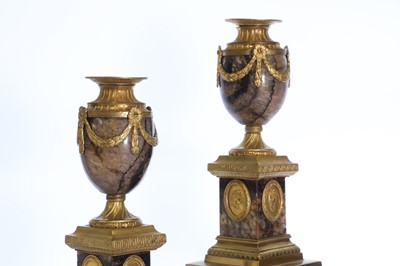 Lot 30 - A pair of George III Derbyshire Blue John and ormolu 'Cleopatra' candle vases
