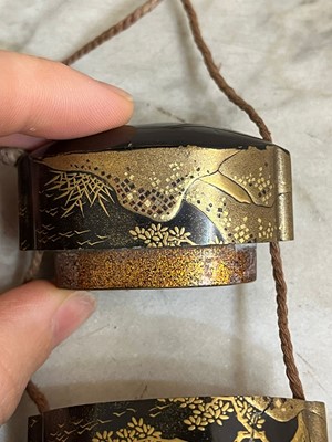 Lot 173 - A Japanese gilt-lacquered inro