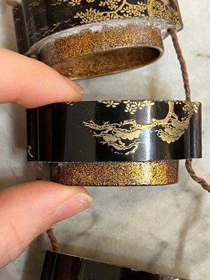 Lot 173 - A Japanese gilt-lacquered inro