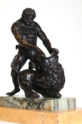 Lot 194 - A patinated bronze figure group after the antique
