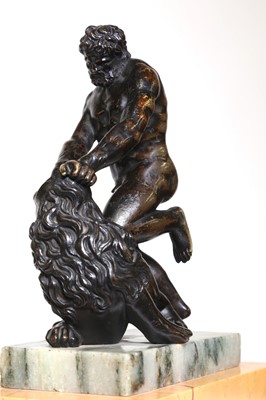 Lot 194 - A patinated bronze figure group after the antique