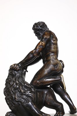 Lot 194 - A patinated bronze figure group after the antique