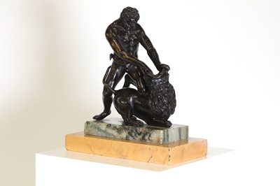 Lot 194 - A patinated bronze figure group after the antique