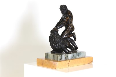 Lot 194 - A patinated bronze figure group after the antique