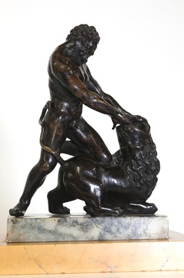 Lot 194 - A patinated bronze figure group after the antique