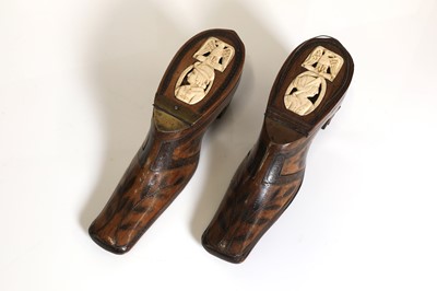 Lot 197 - A pair of treen snuff shoes