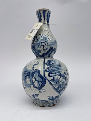 Lot 37 - A delft tin-glazed earthenware double gourd vase