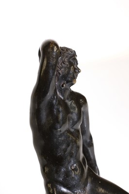 Lot 107 - A grand tour patinated bronze figure after the antique