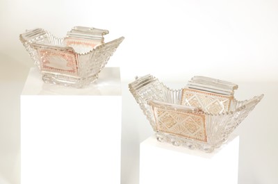 Lot 103 - A near pair of cut-glass butter boats