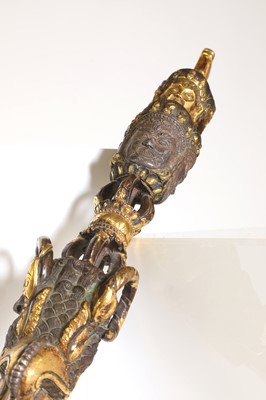 Lot 218 - A Tibetan gilt-bronze phurba