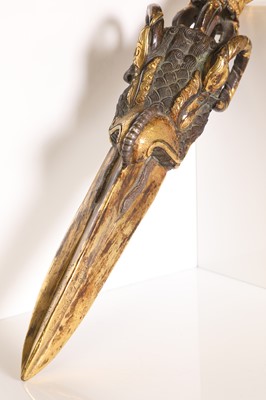 Lot 218 - A Tibetan gilt-bronze phurba