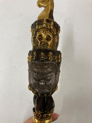 Lot 218 - A Tibetan gilt-bronze phurba