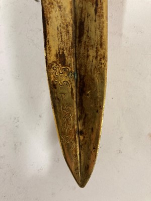 Lot 218 - A Tibetan gilt-bronze phurba