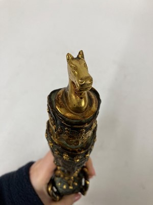 Lot 218 - A Tibetan gilt-bronze phurba