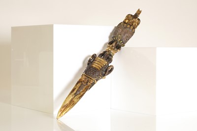 Lot 218 - A Tibetan gilt-bronze phurba