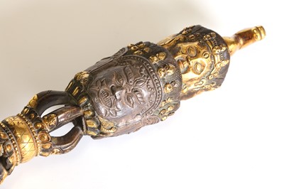 Lot 218 - A Tibetan gilt-bronze phurba