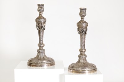 Lot 43 - A pair of German cast silver candlesticks