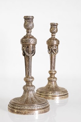 Lot 43 - A pair of German cast silver candlesticks
