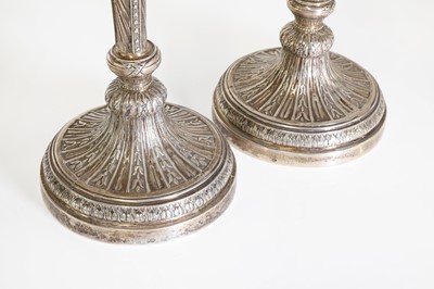 Lot 43 - A pair of German cast silver candlesticks