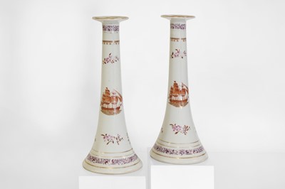 Lot 110 - A pair of export porcelain candlesticks