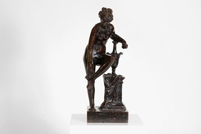 Lot 232 - A patinated bronze figure after the antique