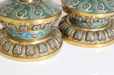 Lot 41 - A pair of gilt-metal-mounted cloisonné candlesticks