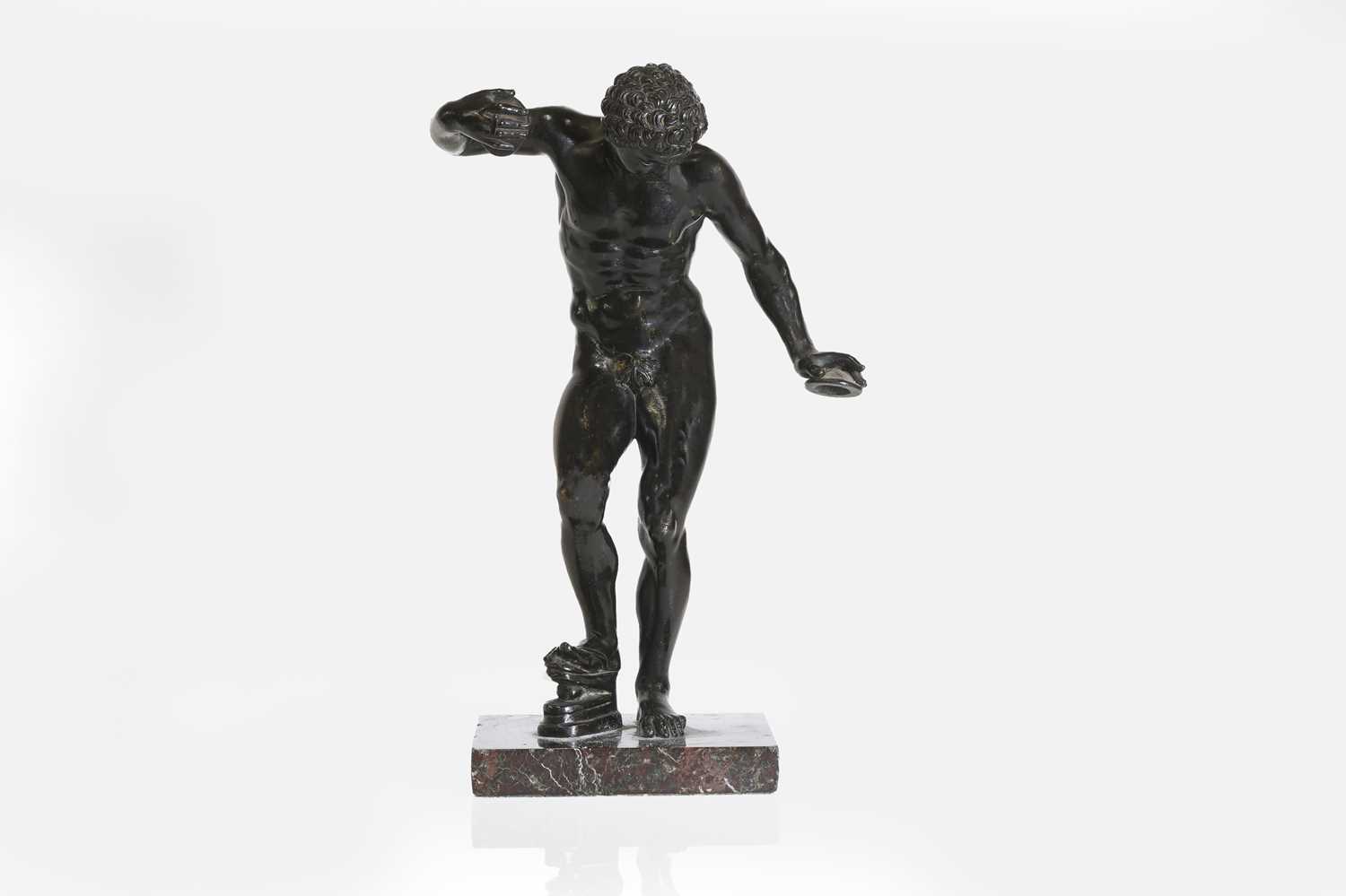 Lot 45 - A grand tour patinated bronze figure, after the antique