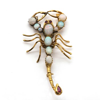 Lot 58 - A gold, opal and ruby scorpion brooch