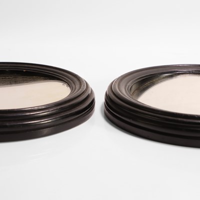 Lot 37 - A rare pair of circular distortion mirrors