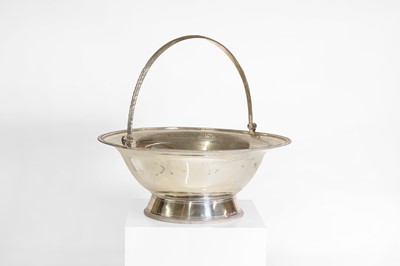 Lot 229 - A George III silver swing-handled cake basket