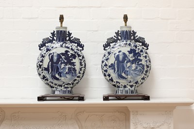 Lot 470 - A pair of Chinese blue and white moon flask table lamps