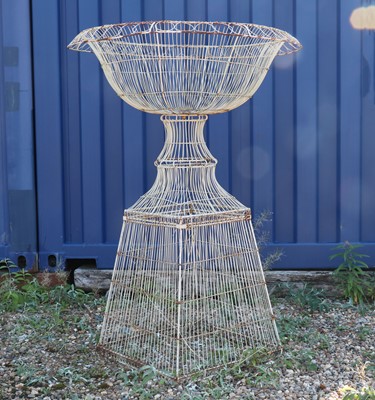 Lot 506 - A wire work urn and stand