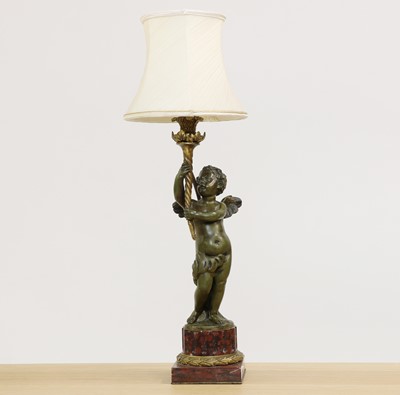 Lot 273 - A bronze and parcel gilt figural table lamp