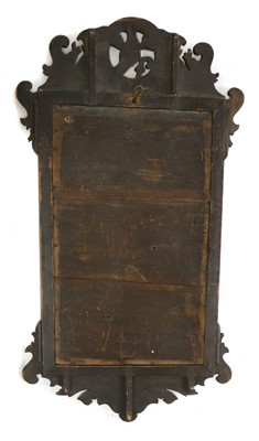 Lot 423 - A George II style mahogany fretwork mirror