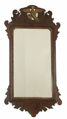 Lot 423 - A George II style mahogany fretwork mirror