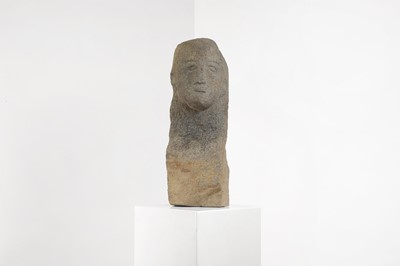 Lot 228 - A carved stone head fragment