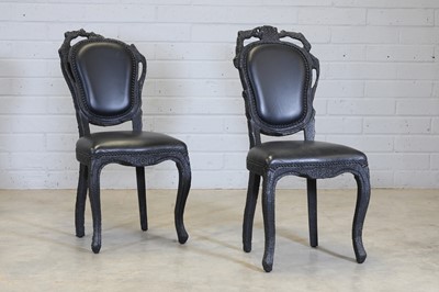 Lot 523 - A pair of 'Smoke' dining chairs