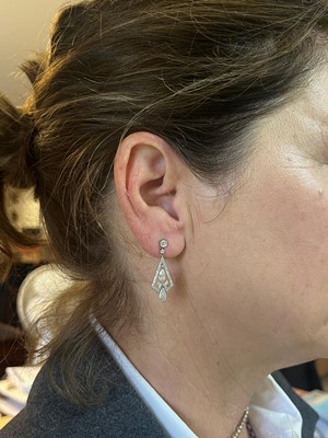 Lot 42 - A pair of Art Deco diamond pendant earrings