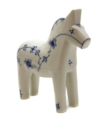Lot 221 - A Royal Copenhagen porcelain 'Blue Fluted Plain' Dala horse
