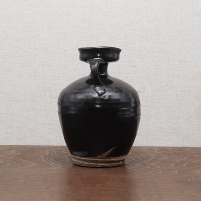Lot 23 - A Chinese black-glazed vase
