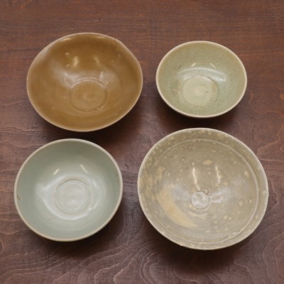 Lot 21 - A collection of four Chinese stoneware bowls