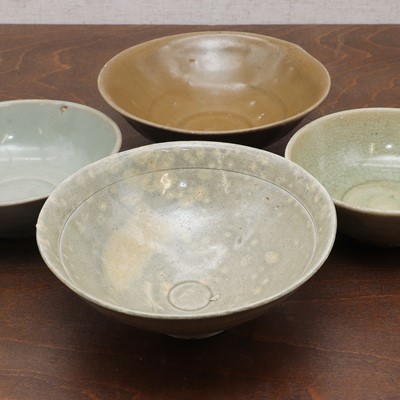 Lot 21 - A collection of four Chinese stoneware bowls